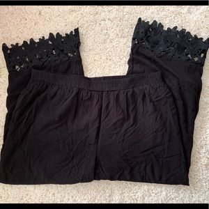 Black pants with lace on the legs